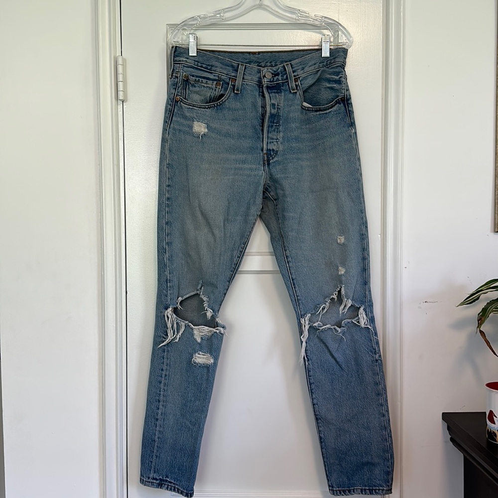 Levi’s 501’s with some holes